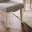 Chaises de salle à manger 2 pièces Finklea au look transitionnel, blanc antique, tissu gris, dos chameau, pieds cannelés, côté rembourré (2 pièces), blanc et gris, revêtement en tissu, conception du dossier, base à garniture cloutée
