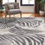 Tapis ivoire à imprimé animal-50919216