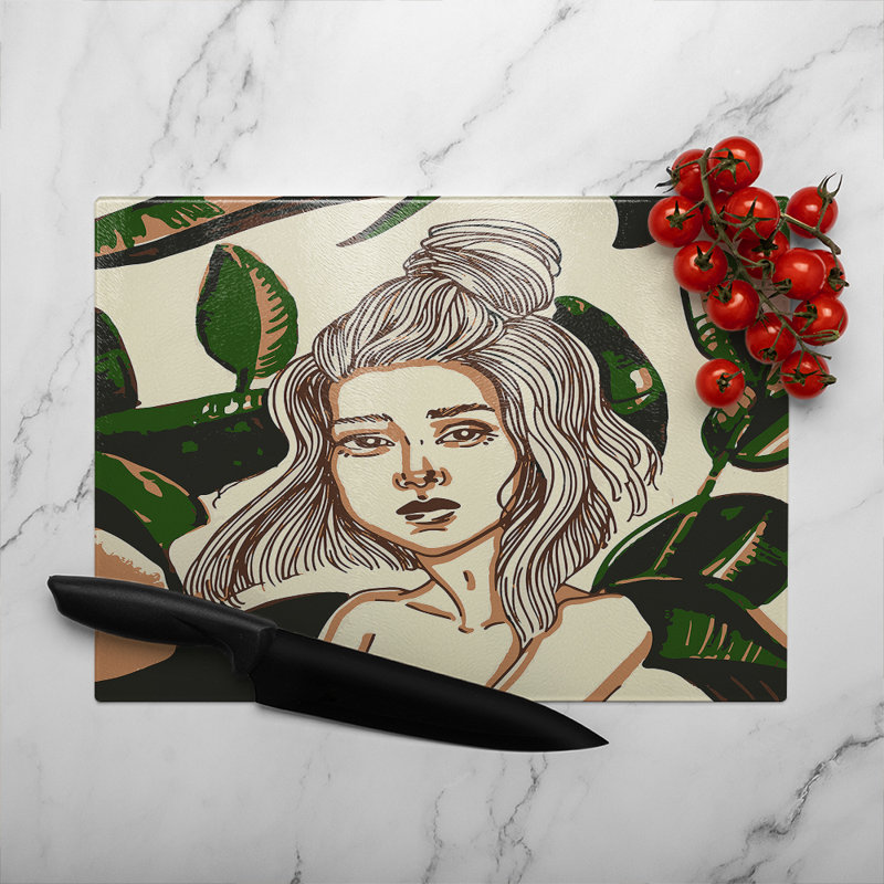 Young woman in tropical leaves Designer Glass Chopping Board, 40cm L x 28cm W