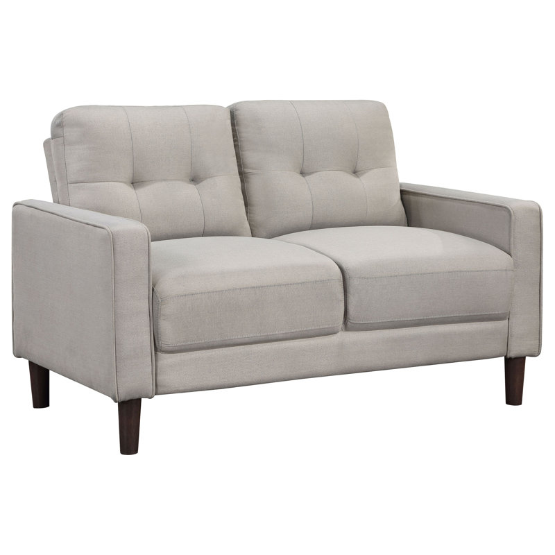 Causeuse capitonnée beige