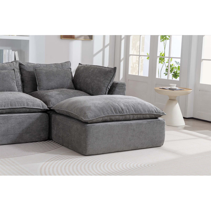 Canapé modulaire surdimensionné surdimensionné avec repose-pieds, sièges profonds et larges pour un confort ultime et des aménagements de salon flexibles.