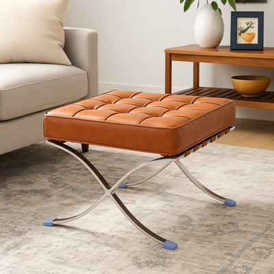 Repose-pieds en cuir capitonné Classic avec structure en acier inoxydable