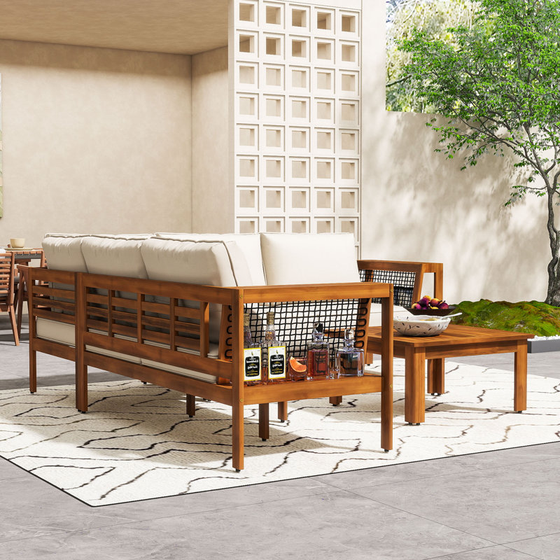 Ensemble de conversation modulaire en L 4 pièces en bois d'acacia avec table basse et coussins pour patio, terrasse ou bord de piscine
