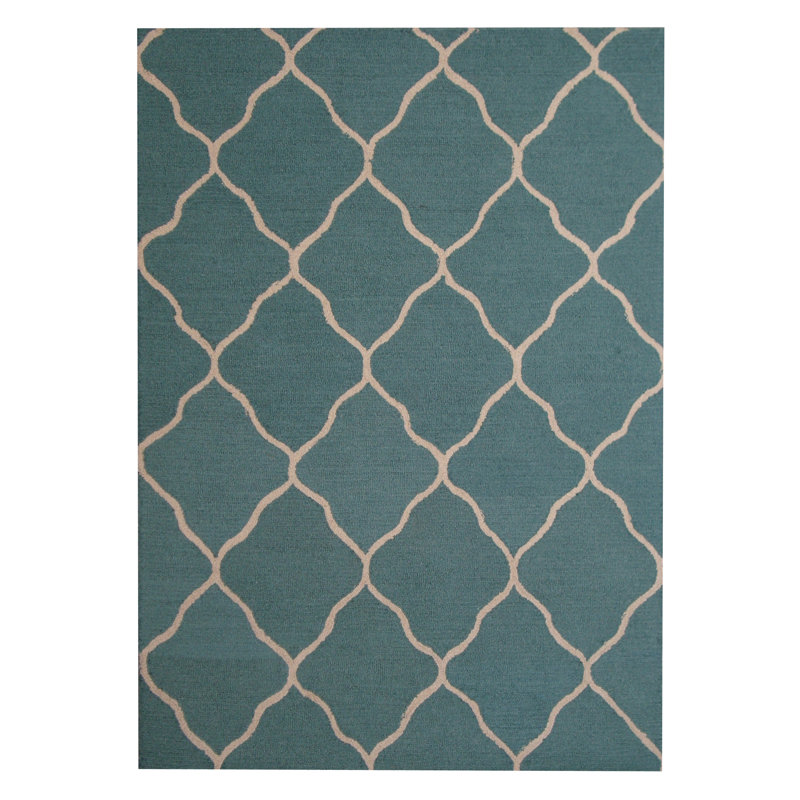 Tapis bleu clair / beige touffeté à la main