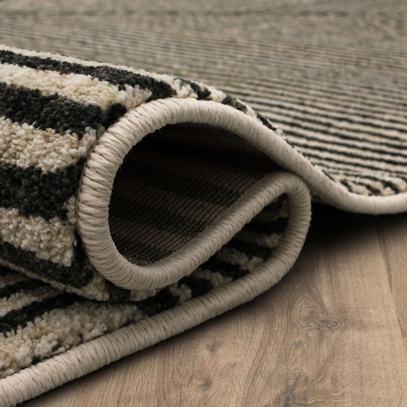 Linea Black Geometric Polyester 28''x94'' Area Rug