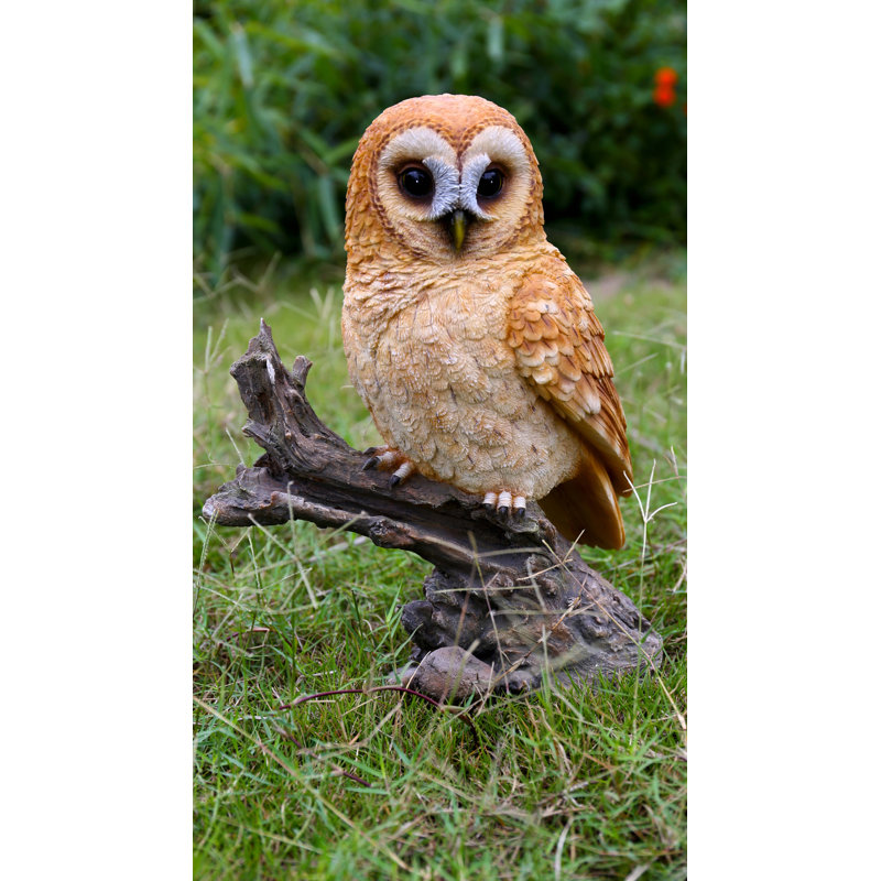Statue hibou sur souches fauve