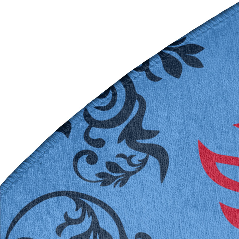 Tapis rond bleu damassé à motif baroque