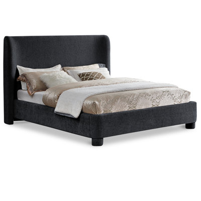 Hridhaan Upholstered Unfinished Wingback Bed