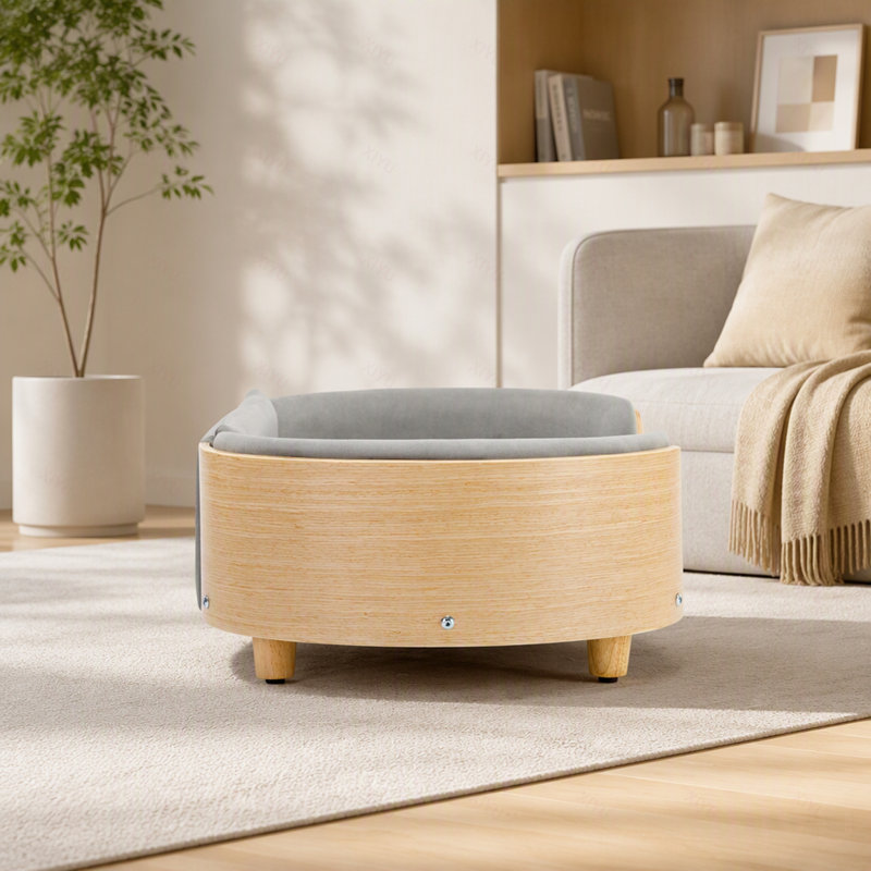 Lit pour chien surélevé de style scandinave avec pattes en bois massif et dossier en bois courbé, coussin en velours