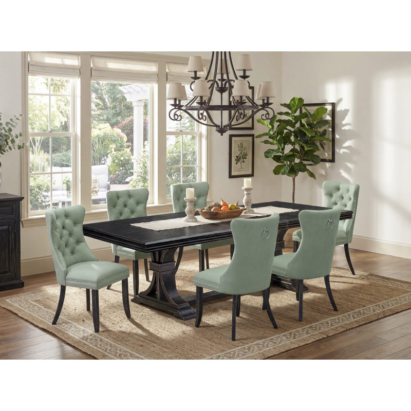 L'ensemble de salle à manger 7 pièces contient une table de cuisine rectangulaire et 6 chaises modernes en polyester vert Willow, noir sablé