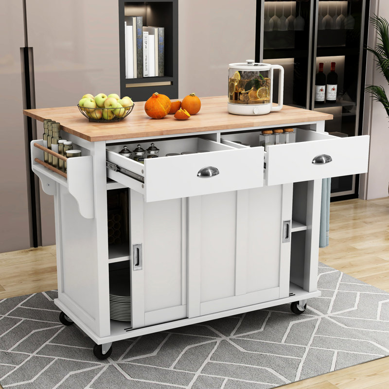 Chariot d'îlot de cuisine blanc avec plateau coulissant et porte coulissante cachée. 2 tiroirs, tablette réglable. 4 roues, îlot fonctionnel, support en métal, armoire à roulettes
