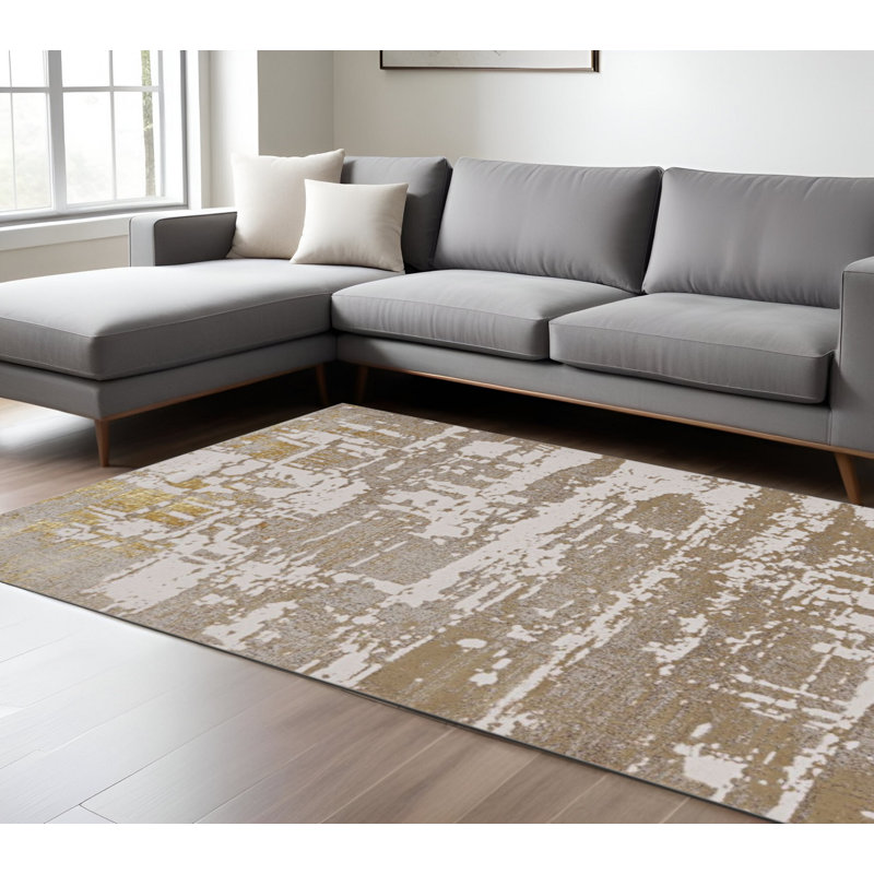 Tapis abstrait taupe et doré 7 pi x 10 pi ivoire