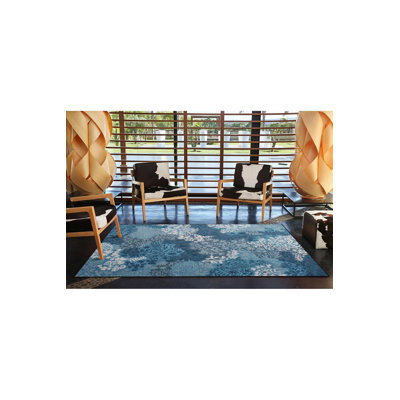 Tapis bleu à motif floral lavable à la machine
