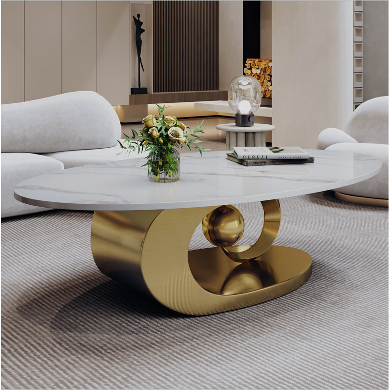 Table basse en marbre avec base sculpturale en acier inoxydable, Doré