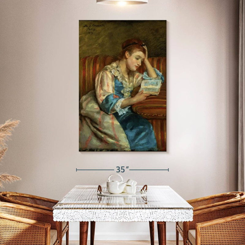 Duffee sur un canapé rayé, H 51 po x l 34 po