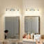 Luminaire de salle de bain moderne à 4 lumières avec abat-jour en verre transparent, applique murale réversible pour meuble-lavabo et miroir