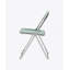 Chaise fantôme pliante transparente avec structure chromée, empilable et peu encombrante pour la vie moderne.