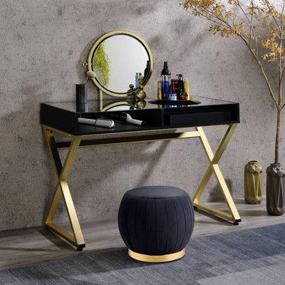 Bureau de meuble-lavabo noir et doré avec miroir et plateau à bijoux