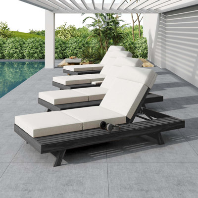Chaise longue d'extérieur de qualité supérieure avec coussins résistants à l'eau, inclinaison à 4 positions, support ergonomique et fabrication en bois d'acacia toutes saisons.