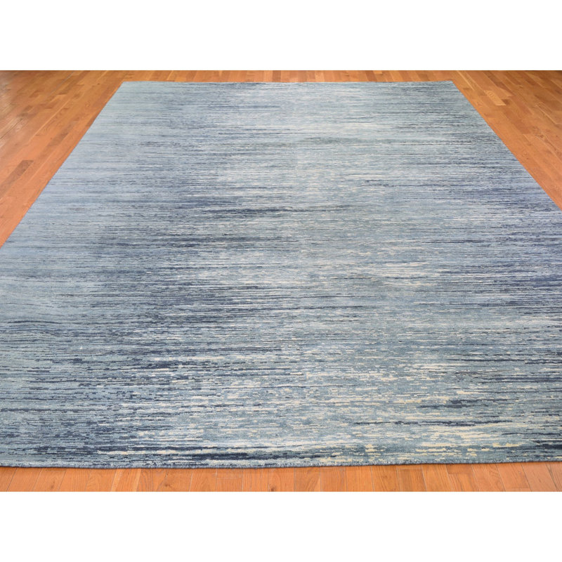Tapis décoratif bleu en laine de conception unique 10 pi 1 po x 14 pi 1 po chante noué à la main