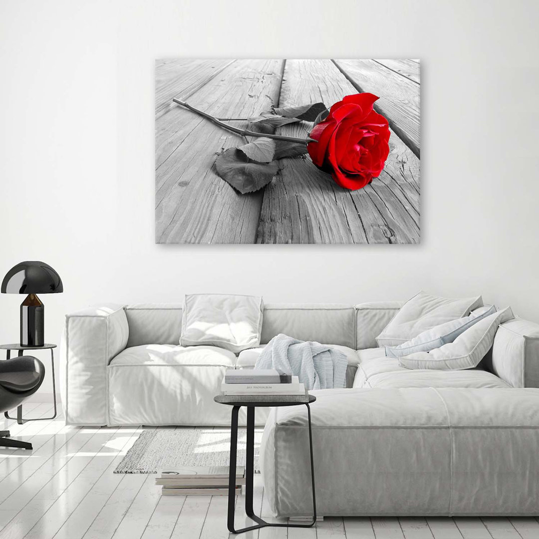 Leinwandbild Red Rose On Wooden Floor