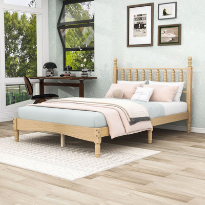 Lit plateforme en bois avec tête de lit en forme de gourde