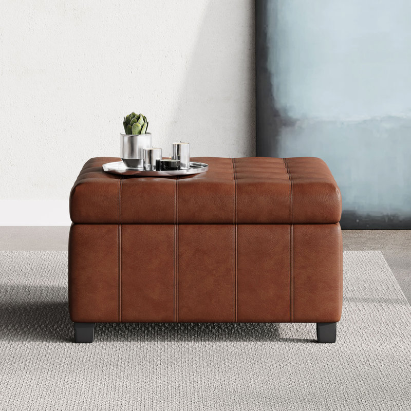 Similicuir brun avec capitonnage élégant et option de rangement confortable