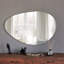 Élégant miroir mural abstrait, finition blanche, 35,4 x 23,6 x 0,5 pouces | Matériau 100% bois aggloméré, fixation murale | Parfait pour la décoration intérieure moderne, rehausse la lumière et l'espace, design élégant et fonctionnel-347939903