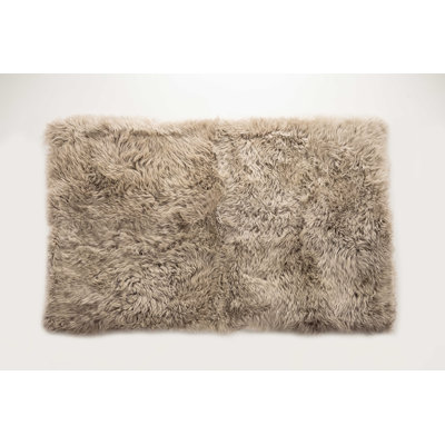 Buchananjr Taupe Sheepskin Area Rug