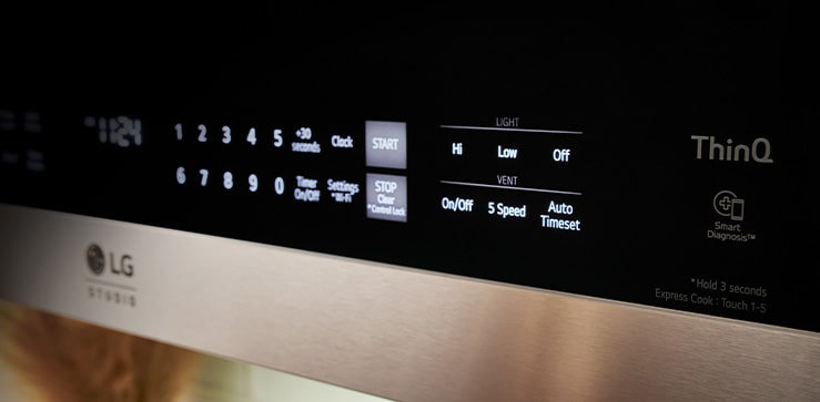 29.88" 1.7 cu ft. 1700 - Watt Convertible Convection Over-The-Range Microwave with Sensor Cooking and Air Frying Capability