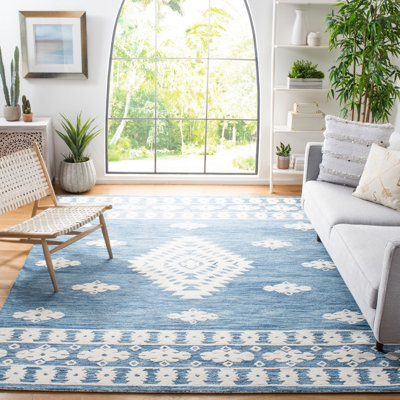 Tapis de style sud-ouest en laine / coton touffeté à la main en bleu