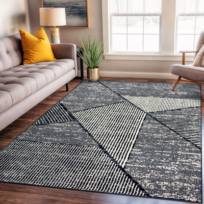 Tapis contemporain délavé à motif géométrique