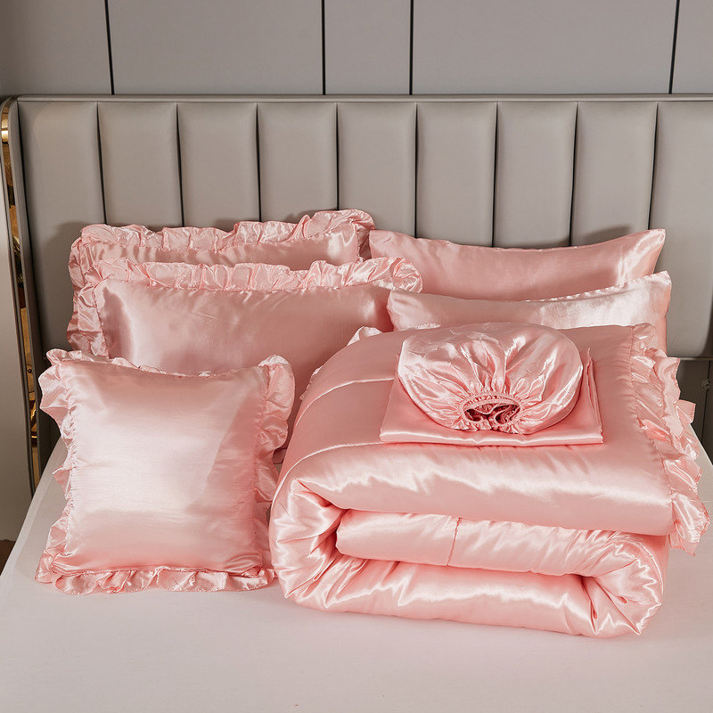 Ensemble d'édredon en satin avec draps pour grand lit 8 pièces Ensemble de literie soyeux rose à motif de volants avec 1 housse de coussin