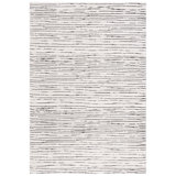 Tapis ivoire / noir en polyester tissé à la machine Simrita