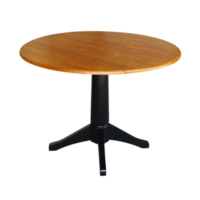Sturges Extendable Round Solid Wood Dining Table