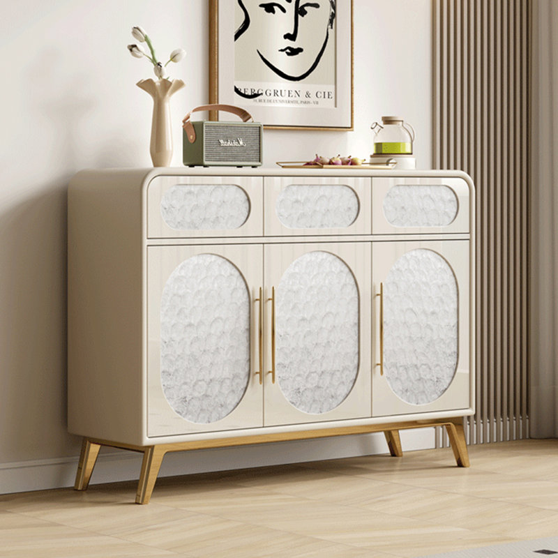Cabinet With Shell Pattern Doors