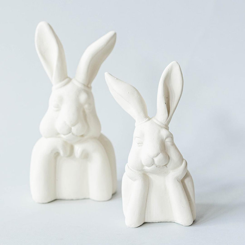 White Rabbit Leaning On Its Paws Figurine