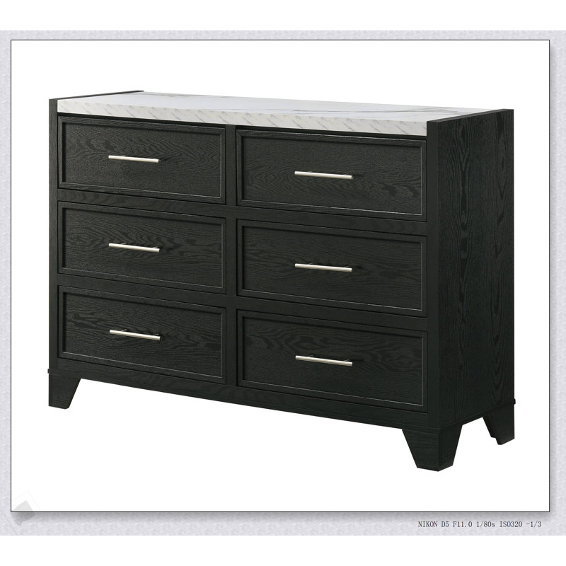 Commode contemporaine à 6 tiroirs avec plateau en faux marbre et finition noire contemporaine, parfaite pour les solutions de rangement élégantes.