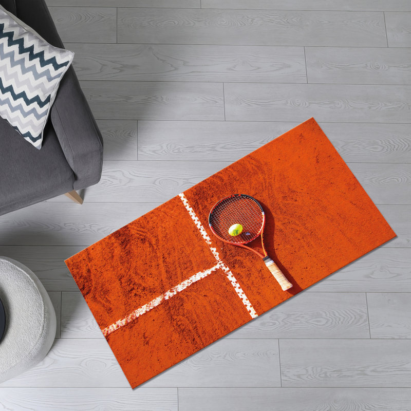 Tapis à poils doux avec motif géométrique rouge et bleu éclatant, idéal pour ajouter une touche de couleur à tout espace de vie