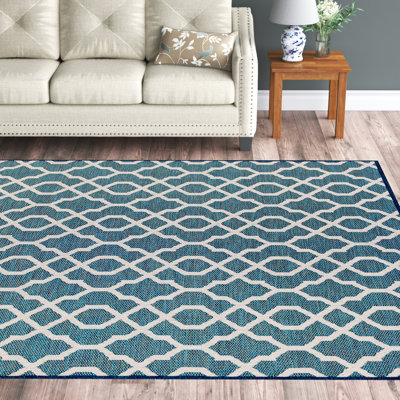 Tapis intérieur / extérieur bleu marine / ivoire à tissage plat Mccampbell