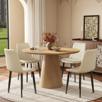 Ensemble de salle à manger rond avec chaises en similicuir