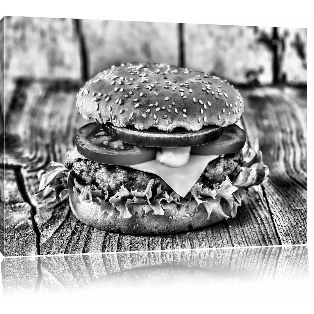 Leinwandbild Leckerer Cheeseburger in Monochrom