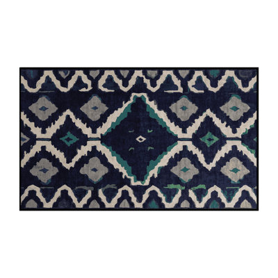 Tapis gris lavable à la machine