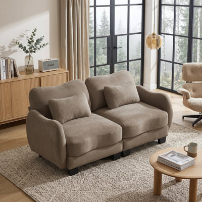 Canapé en chenille Cloud-Comfort avec courbes ergonomiques et coussin lombaire délicat - un soutien moderne et élégant pour les salons