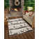 Le tapis Holiday Aisle® Kareema