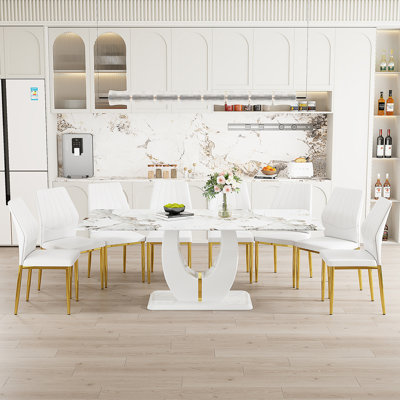 Ensemble de table de salle à manger rectangulaire de 71 po pour 8 personnes comprenant un plateau en faux marbre et des chaises en cuir de polyuréthane. Cet ensemble de salle à manger de 9 pièces convient aux maisons, aux restaurants et aux espaces de bureau.