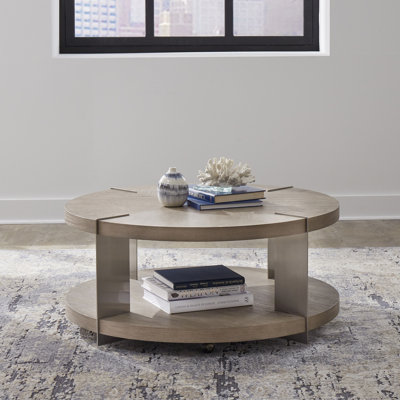 Table basse ronde Euzelia avec pieds et roulettes en métal