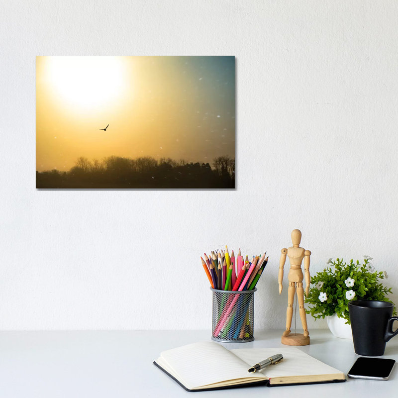 Bird Flying Through Blizzard by Nik Rave - Wrapped Canvas Print, 20.32 cm H x 30.48 cm W