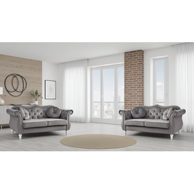 Ensemble de 2 causeuses en velours bleu marine Geneva