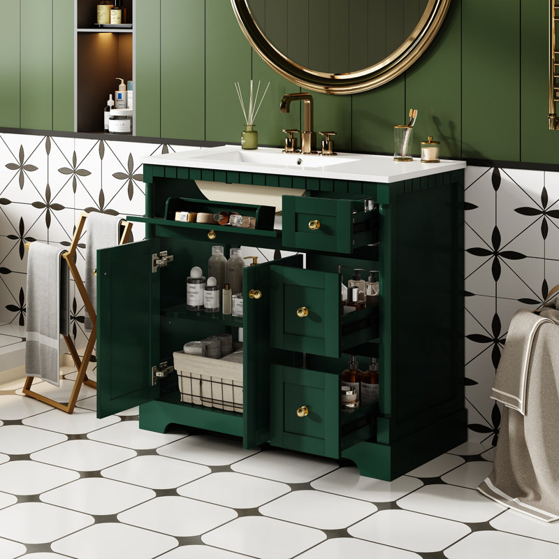 Ce meuble-lavabo moderne de 36 po avec comptoir pour salle de bain comprend une tablette réglable, des portes à fermeture douce, 3 tiroirs et un tiroir basculant